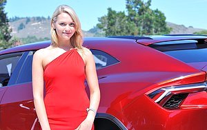 Red dress blonde shows her insane flexibility in a solo gallery