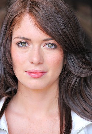 Hot babe posing in a foot fetish gallery with a very fun twist