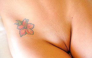 Young chick shoves her white cotton panties inside of her pussy