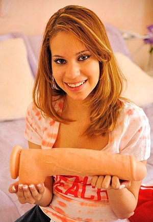 Adorable solo babe showing her stripping skills for the camera