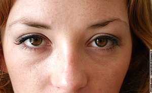 Appealing teen shows her sexy soles in an appealing solo gallery